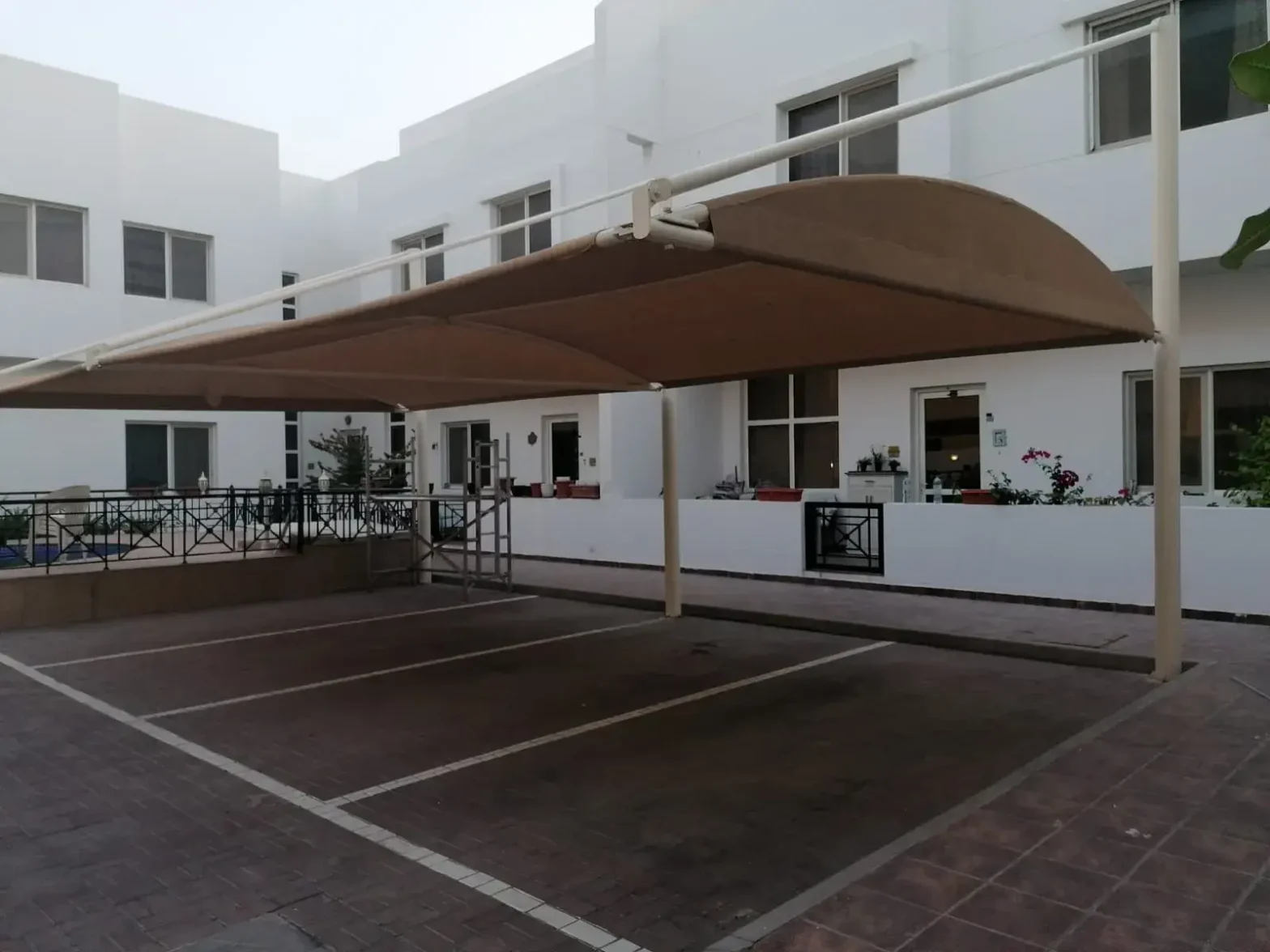 alt="car parking shade suppliers in UAE"