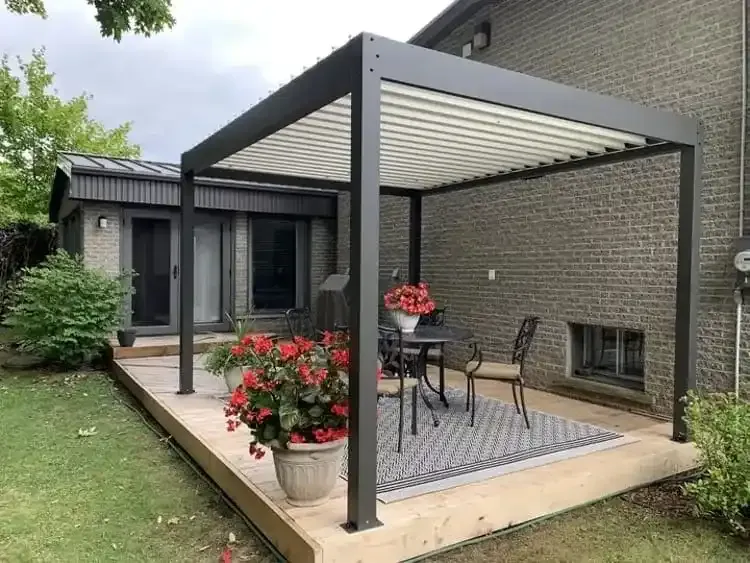 Motorized aluminium louvered pergola over a villa patio, UAE